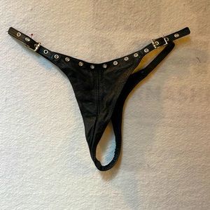 Stormy Leather thong, black, adjustable with grommets.